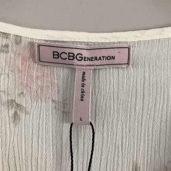 NWT BCBGeneration | Cream Floral Peplum Hem Blouse | Large - Picture 10 of 11